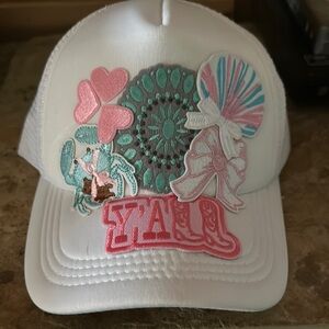 White Cap with Colorful Embellishments